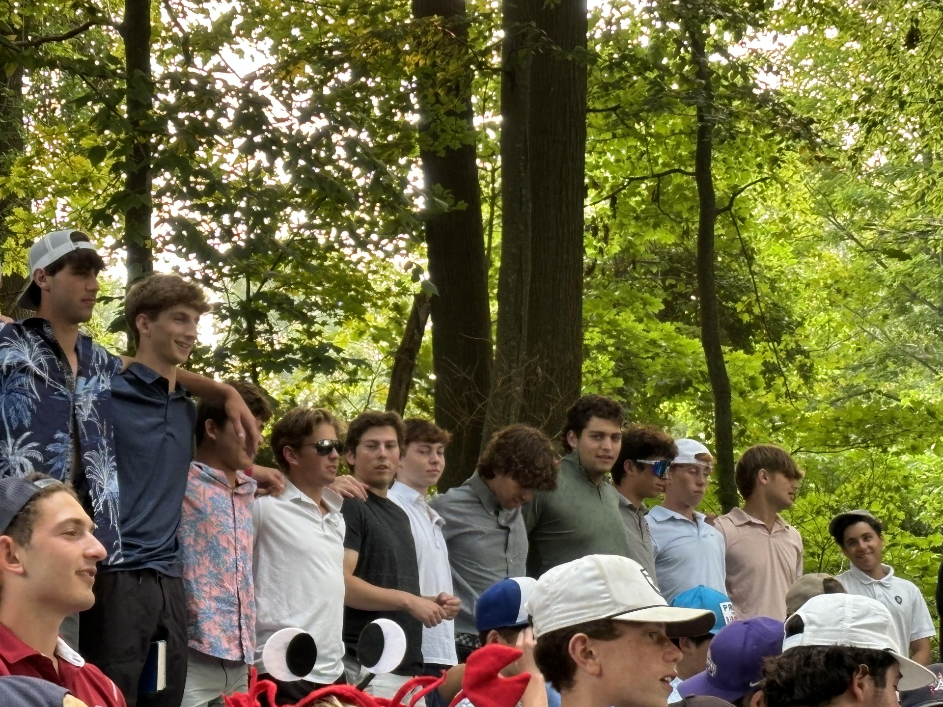 Kids gathered outdoors at summer camp